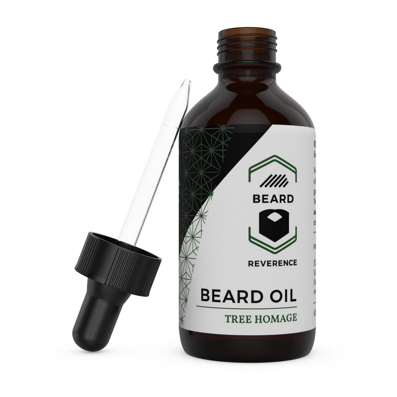 Beard Reverence Tree Homage Beard Oil with dropper top laying next to it. 
